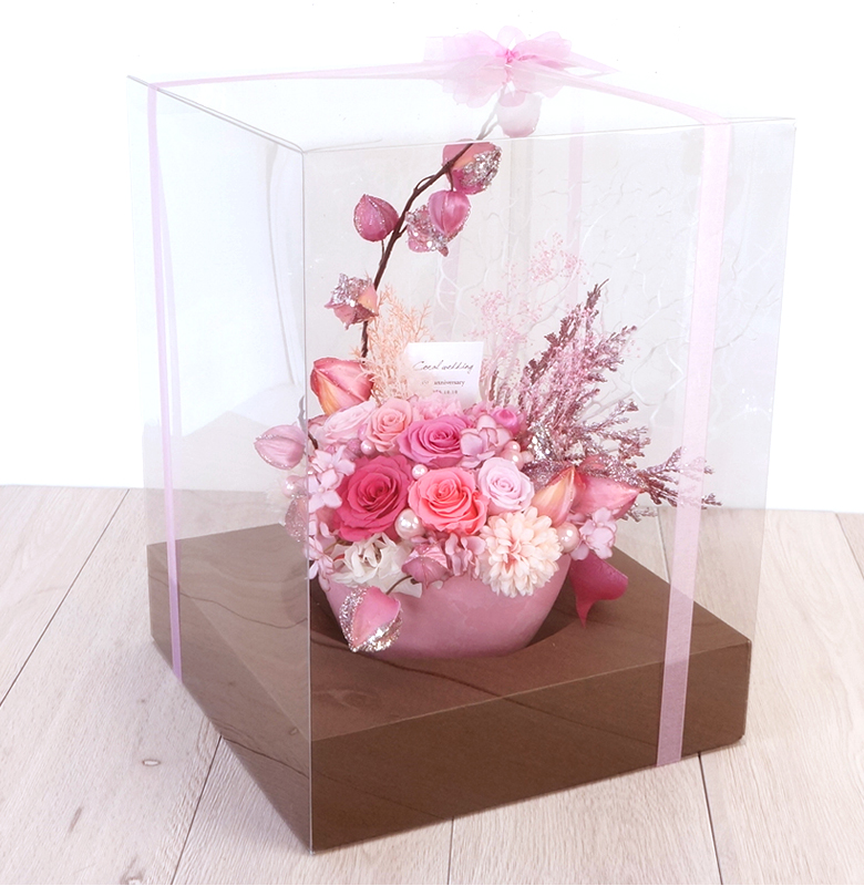 クリアケースにリボンをかけてお届け